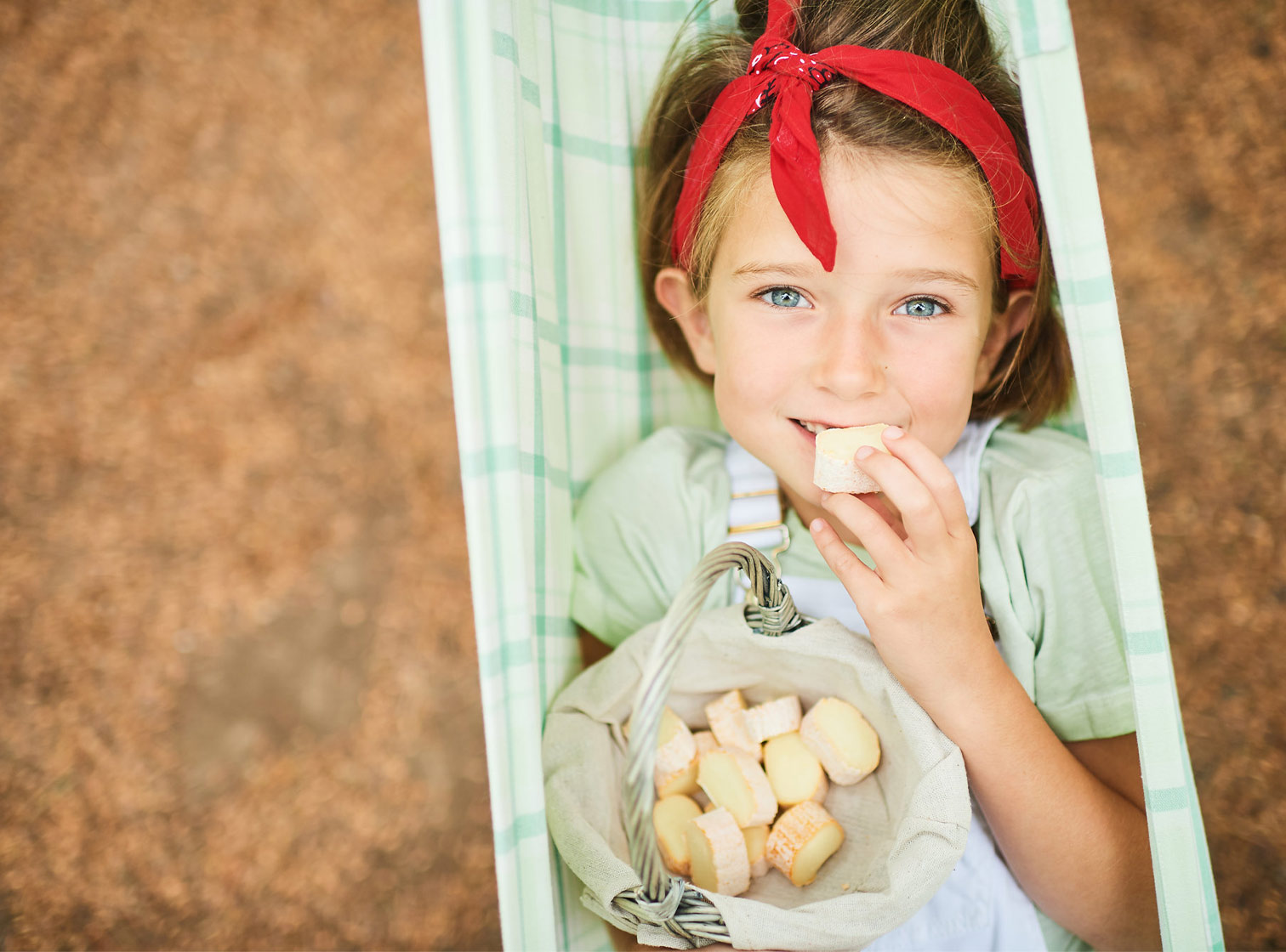 Little girl eating Fagotin Cheese